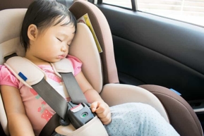 Little Girl in a Carseat
